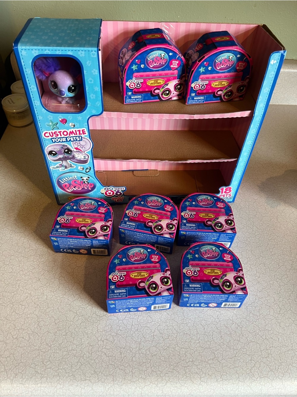 Lot of 7 littlest pet shop surprise season 6 with free display
